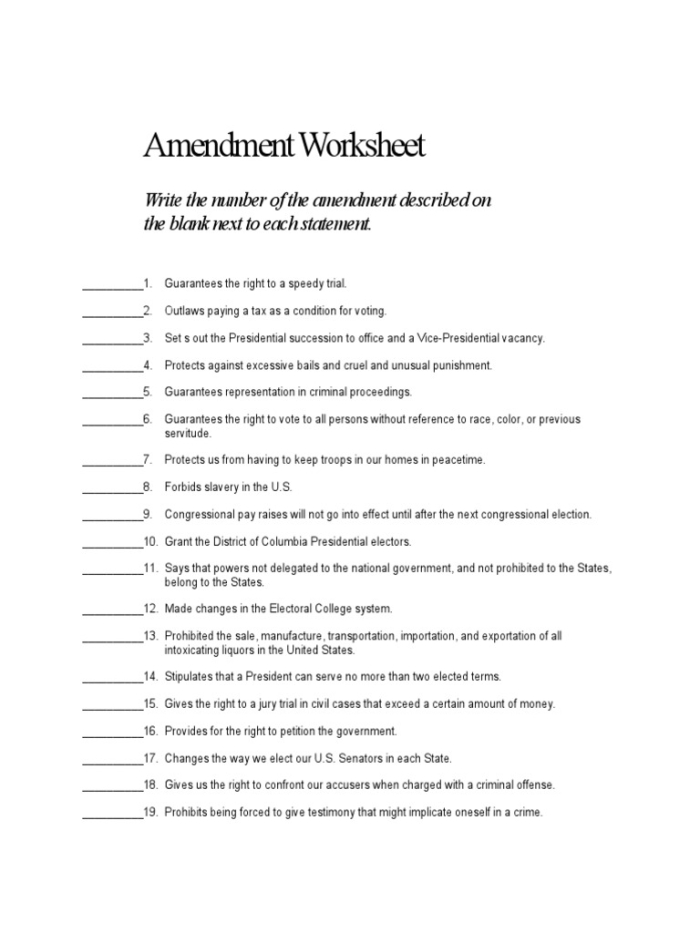 Fourth grade students completing a printed U.S. Constitution amendments quiz worksheet