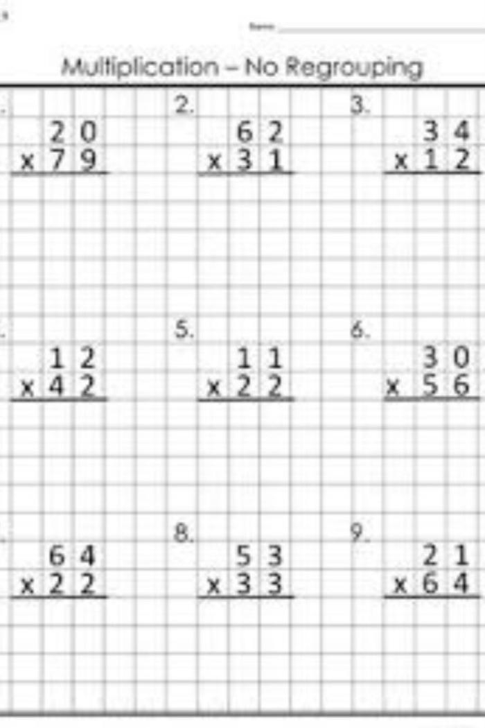 Fourth grade multiplication regrouping worksheet featuring two pages of two-digit math problems