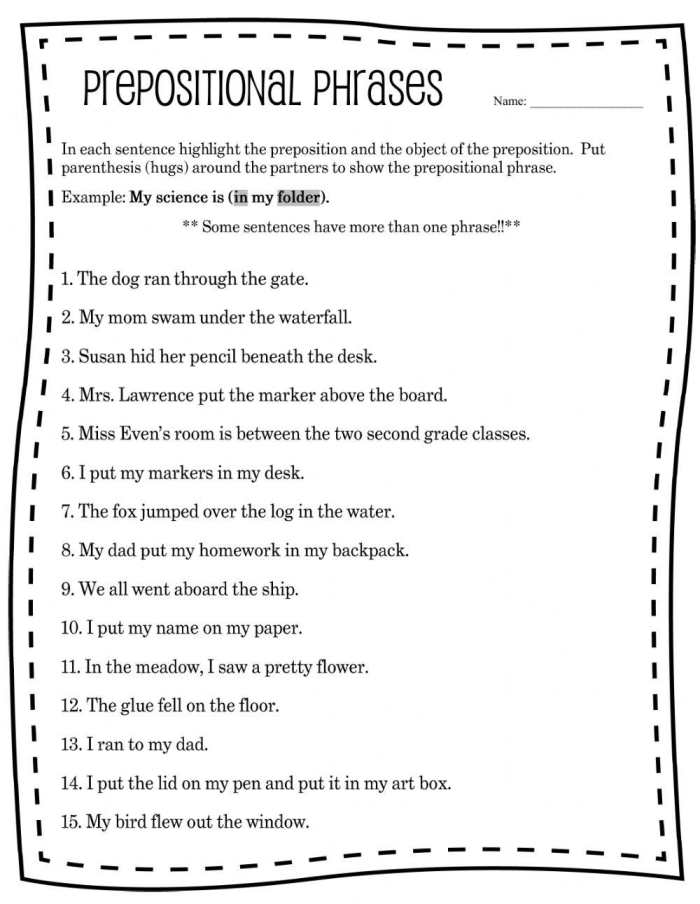 Fourth grade students identifying and writing prepositional phrases on a practice worksheet