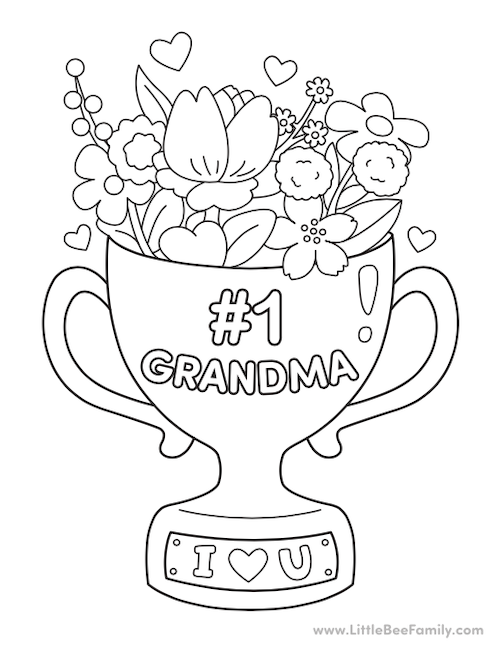 Kindergarten student coloring a festive space-themed Grandparents Day worksheet