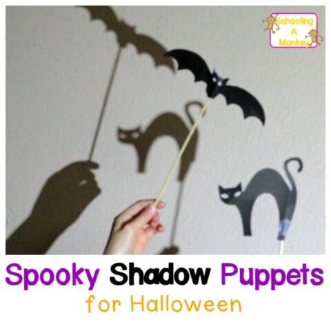 Kindergarten student coloring in a Halloween shadow puppet activity sheet