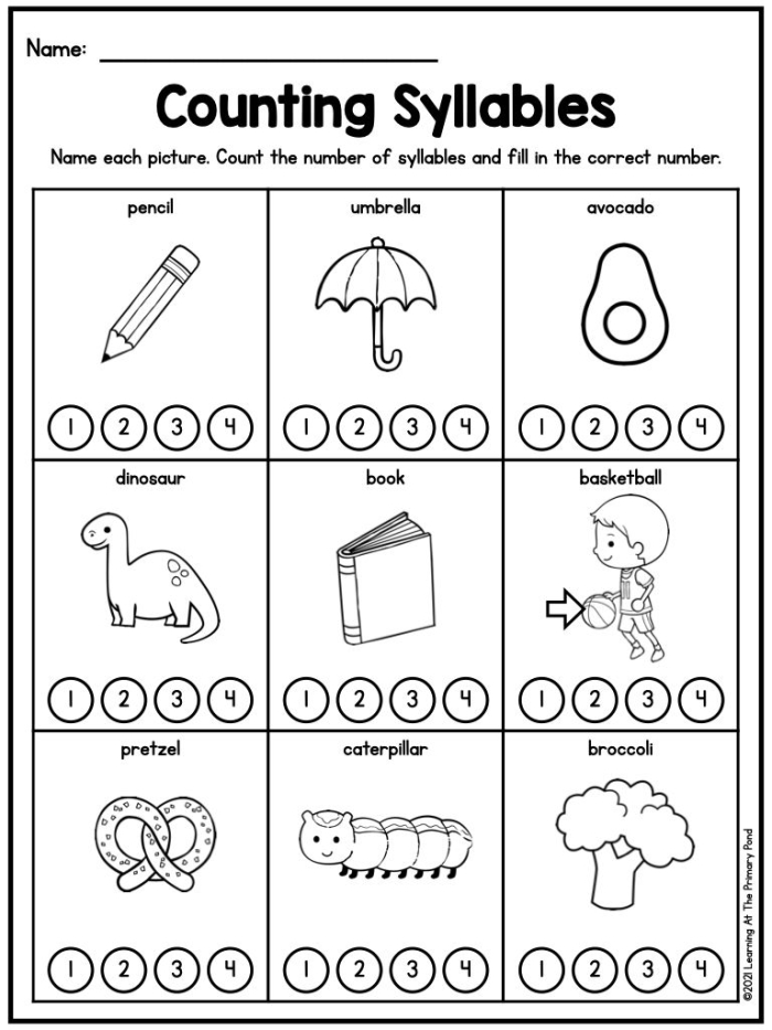 Interactive syllable counting activity with clapping demonstration for beginning readers First grade student clapping out syllables while learning to count syllables in words