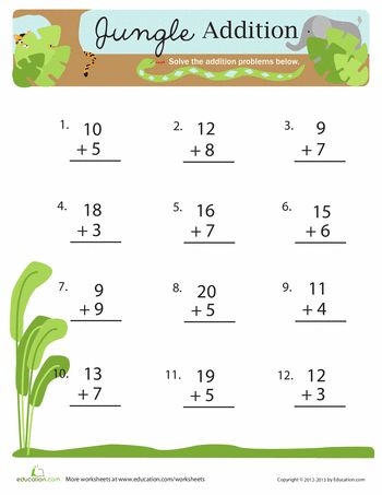First grade students solving one and two digit addition problems on a jungle-themed worksheet