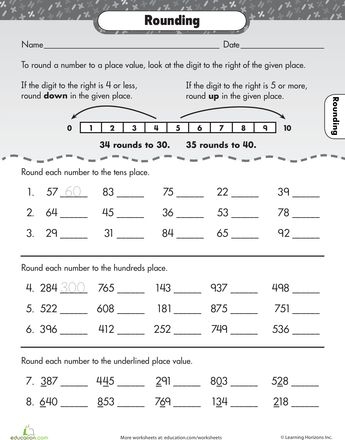 Kids engaging with the Let's Go Rounding! worksheet for rounding practice in math