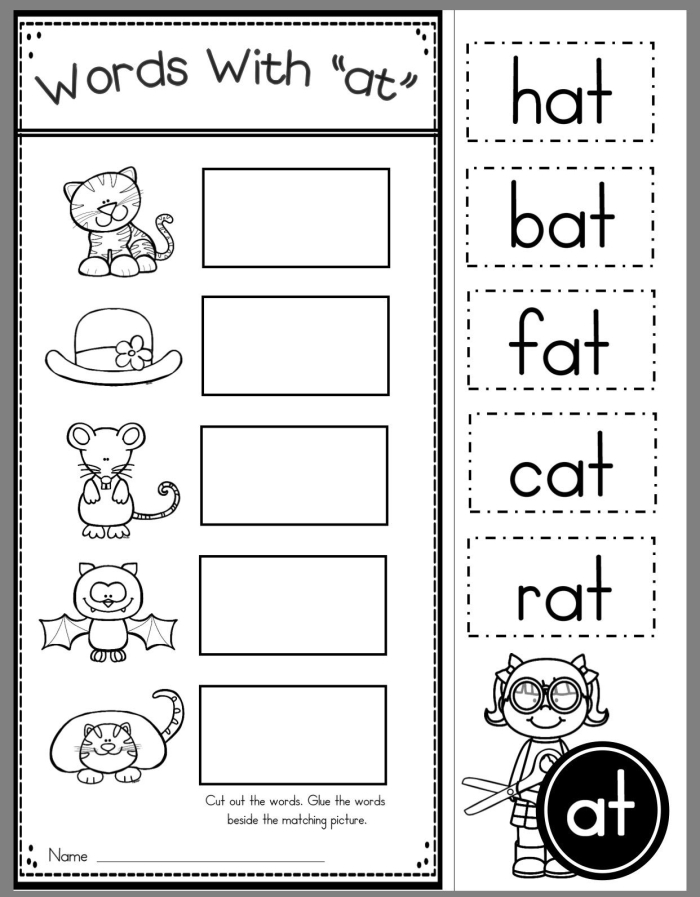 Kindergarten student completing a word family worksheet by identifying at words from pictures