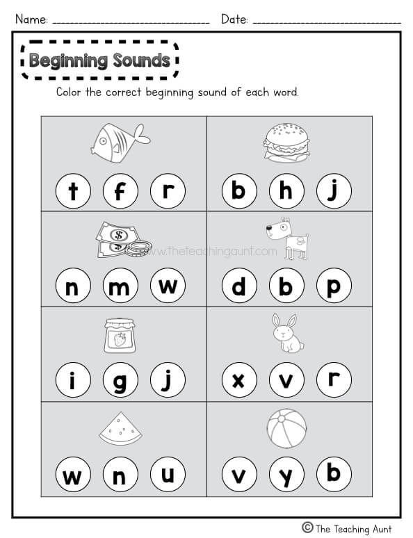 Kindergarten student matching letters to beginning sounds on a review worksheet