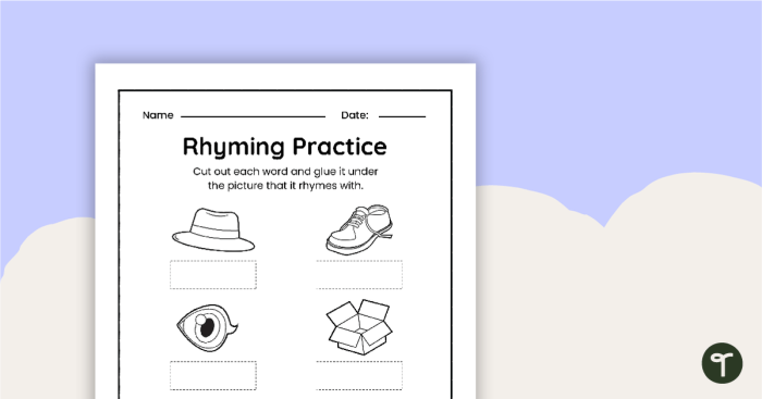 Kindergarten student practicing rhyming sounds with a cut-and-paste life science worksheet 17