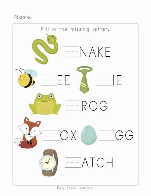 Kindergarten student completing a phonics worksheet by filling in the missing starting letter for various CVC words