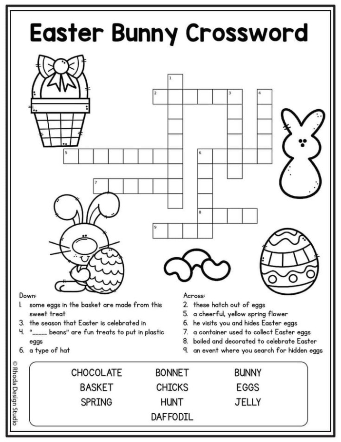 Kindergarten student solving an Easter crossword puzzle worksheet with colorful bunny graphics