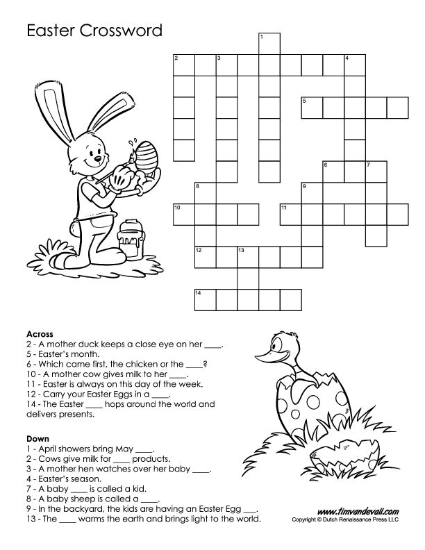 Kindergarten student solving an Easter crossword puzzle worksheet with colorful holiday illustrations