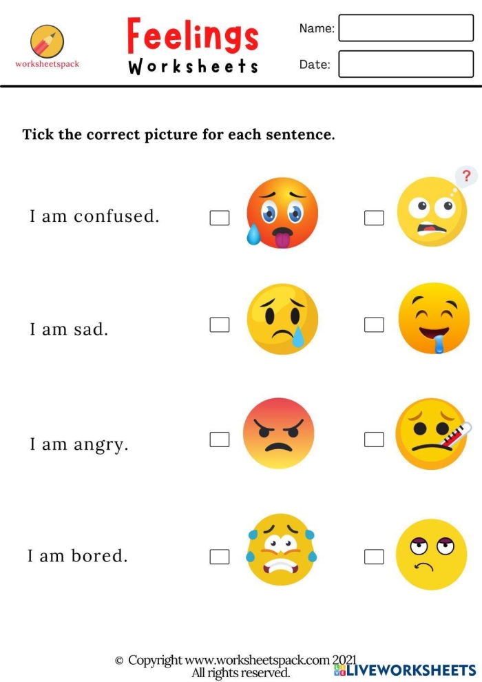 Kindergarten student drawing happy and sad faces on a feelings worksheet for social emotional learning