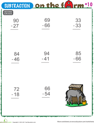 Kindergarten students solving farm animal subtraction problems on a worksheet