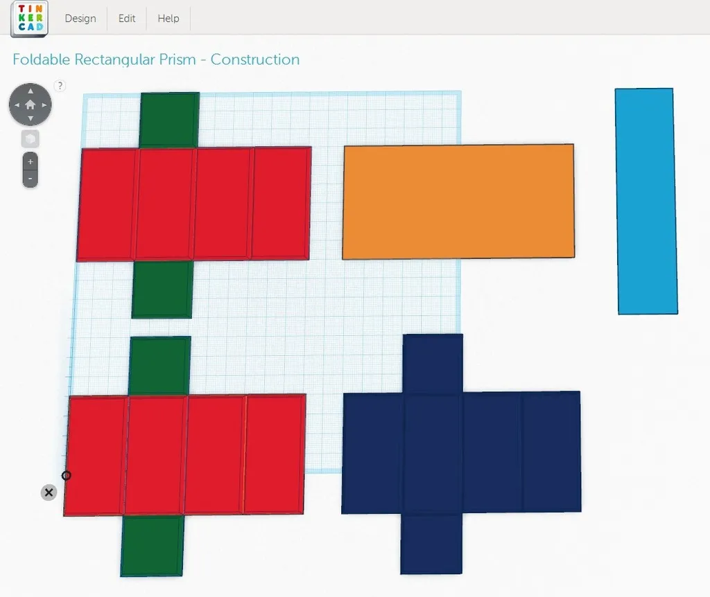 Kindergarten student cutting out a paper net to assemble a rectangular prism for geometry practice
