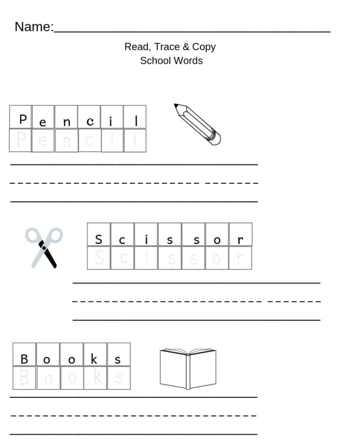 Kindergarten students practicing handwriting on a food-themed Copy It! worksheet