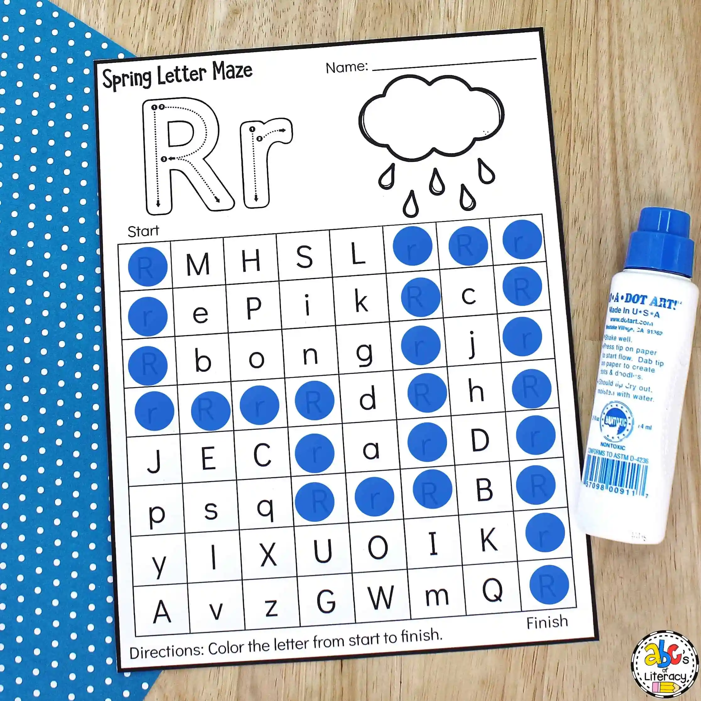 Engaging A Maze activity for young learners to strengthen letter recognition skills A fun Letter Maze worksheet for kindergarteners featuring the letter A with an apple and hand illustration