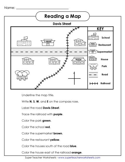 Kindergarten student coloring a park map worksheet for geography skills