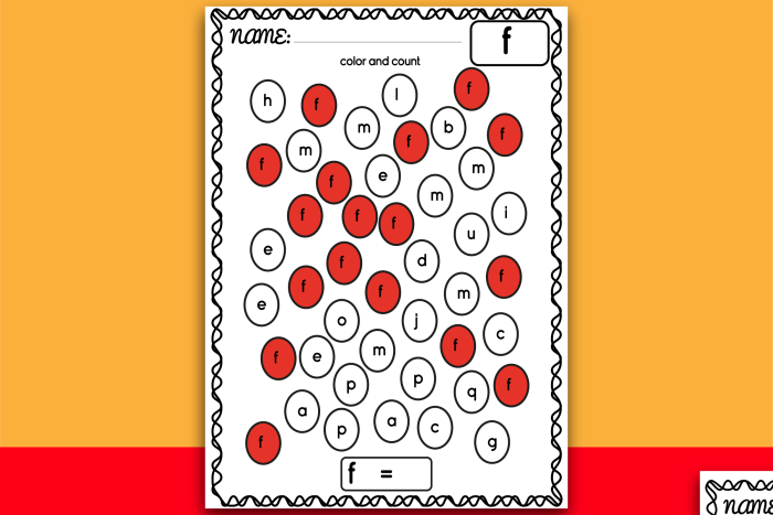 Kindergarten student completing a phonics worksheet for lowercase letter recognition