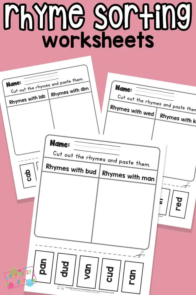 Kindergarten student completing a cut-and-paste rhymes worksheet about life science themes