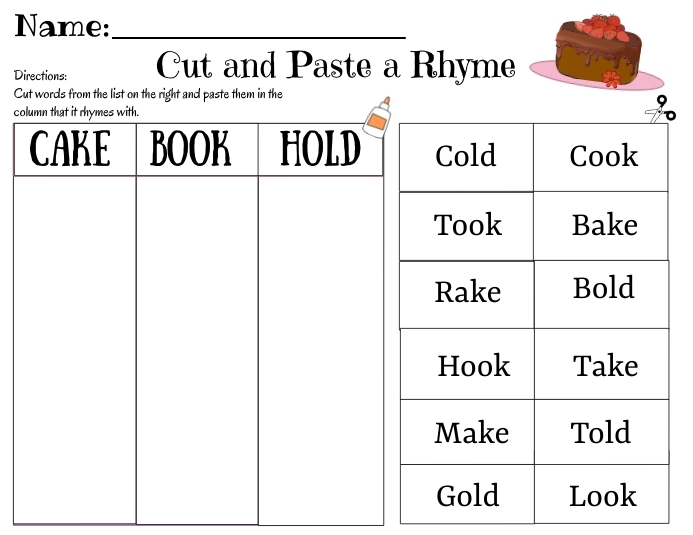 Kindergarten student cutting and pasting rhyming word pairs on a worksheet activity sheet