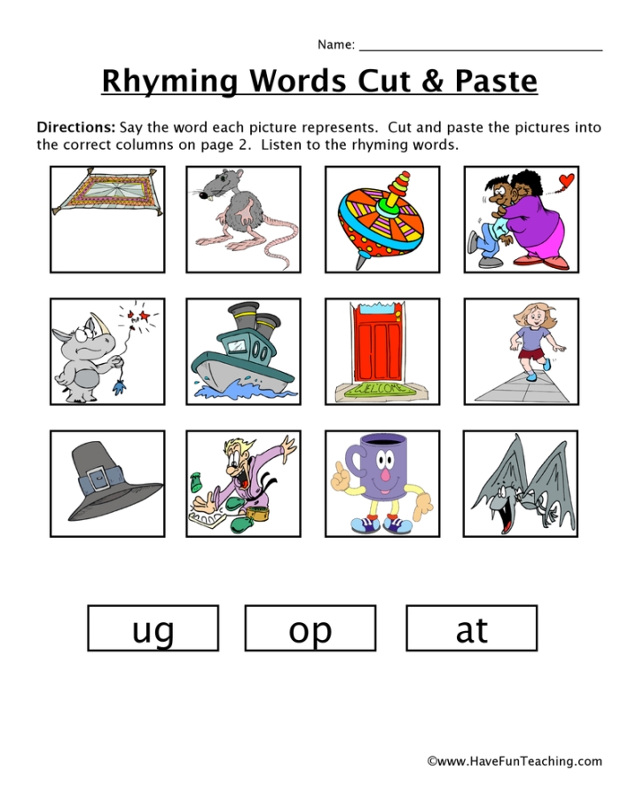 Kindergarten student working on a Cut-and-Paste Rhymes worksheet featuring life science vocabulary