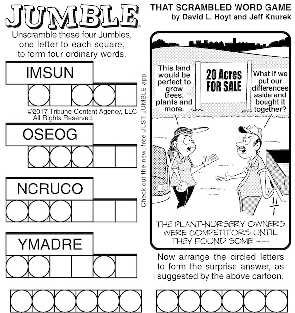 Kindergarten student coloring a shape jumble division worksheet page four