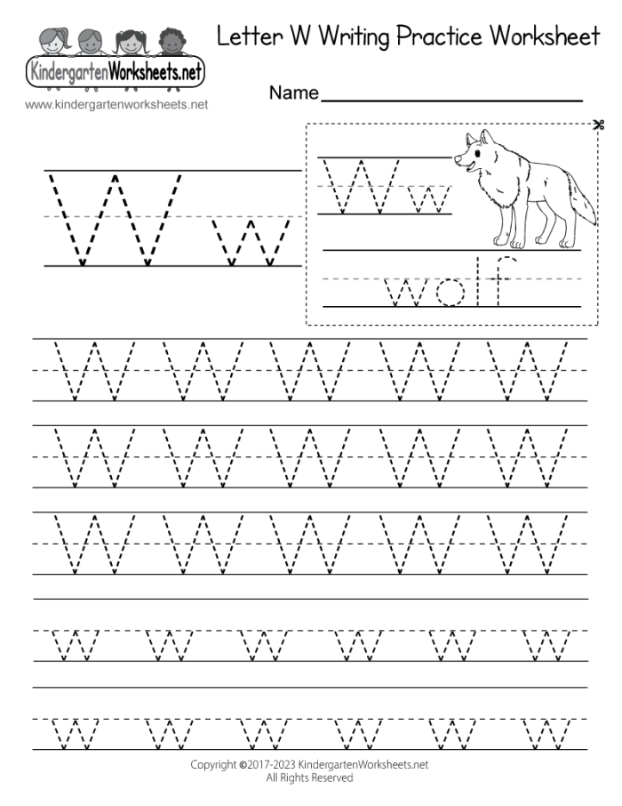 Preschooler identifying words starting with the letter W on a printable worksheet