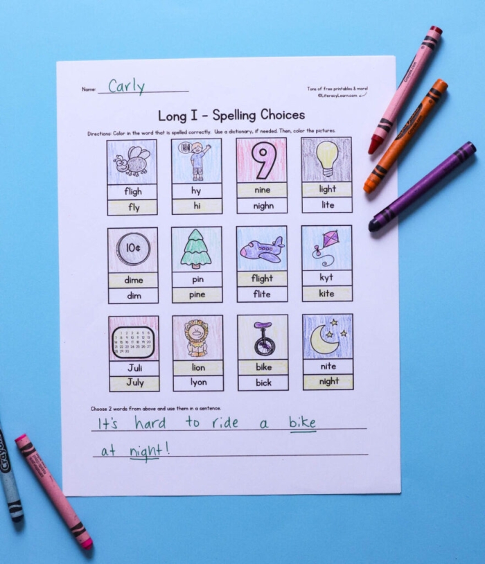 Long i word practice worksheet for first grade students image five First grade student working on a long i sound phonics practice worksheet by filling in the blanks