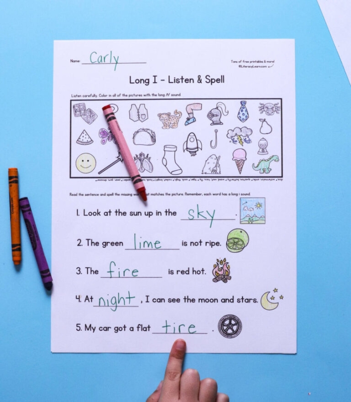 Long I Vowel Sounds Worksheet for First Grade Exercise 18 First grade student completing a Long I practice worksheet by filling in blanks with words from a bank