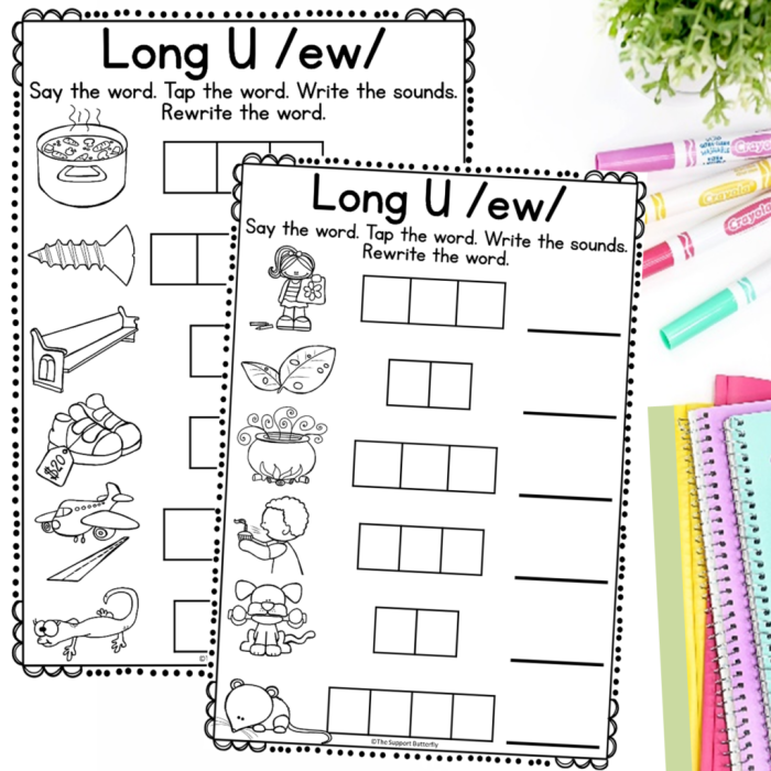 Fourth grade students completing a phonic exercise to sort words containing the long U vowel teams ui ew and ue