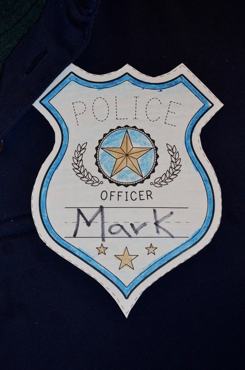 Printable police badge worksheet for kindergarten students to learn about community helpers.