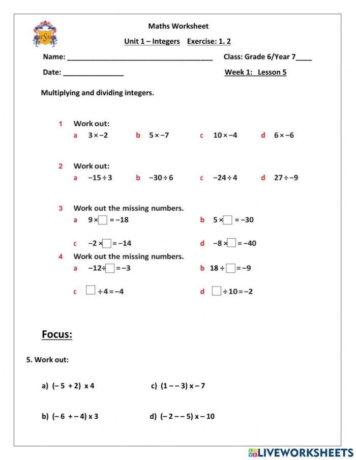 Students engaging with a one-page worksheet on multiplying and dividing integers