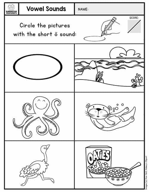 First grade student working on a color by short vowel sound worksheet with phonics illustrations