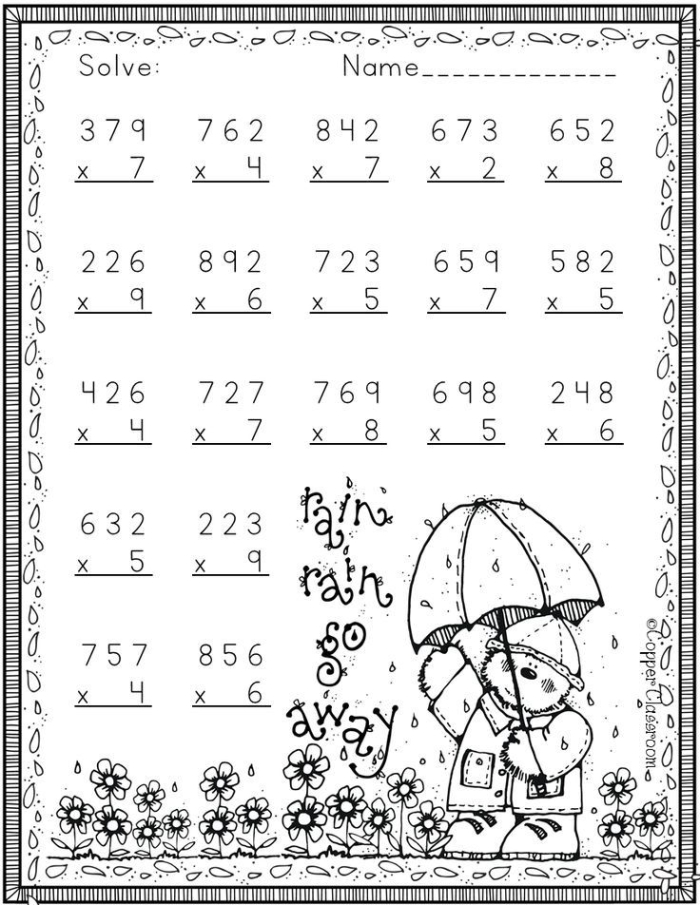 A fifth grader solving winter-themed three-digit multiplication problems on a Let it Snow worksheet with snowflake decorations