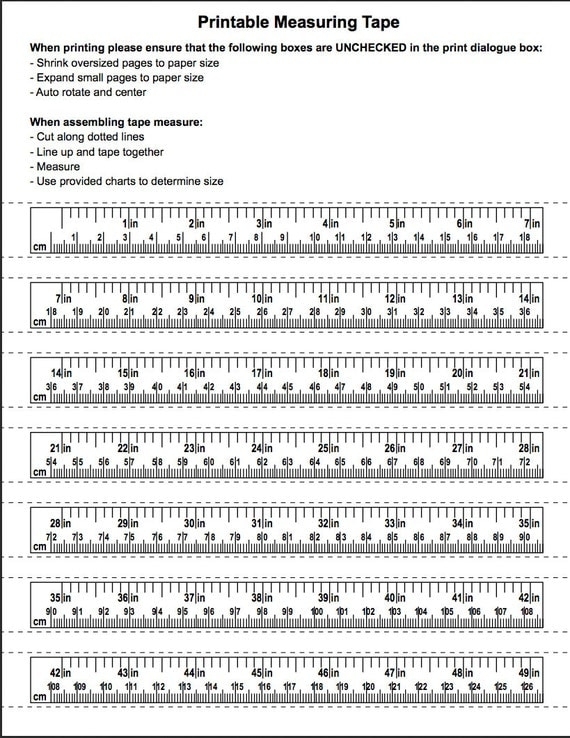 Second grade student worksheet showing a house illustration and paper rulers to practice measuring in inches