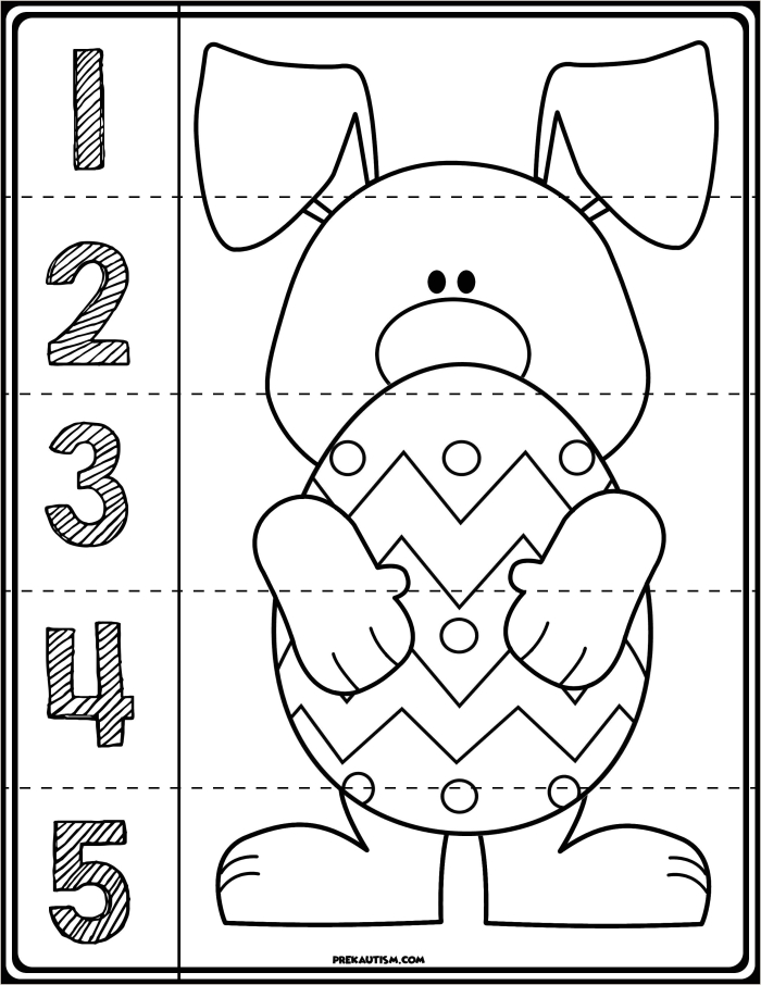 Kindergarten student cutting and coloring a paper Easter Bunny craft worksheet