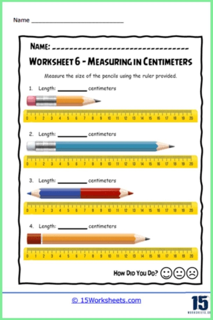 First grade students practicing length measurement by using small paper rulers to find values in centimeters