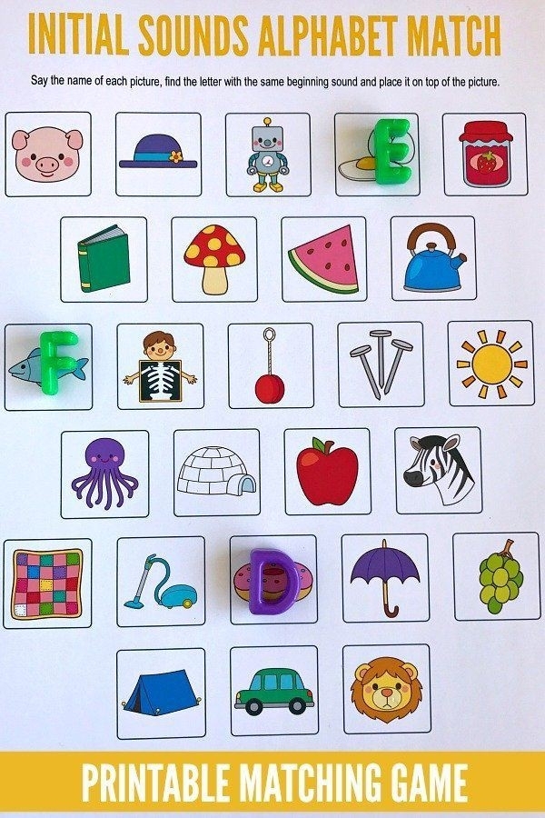 Pre-K student working on a beginning sounds letter match-up worksheet with colorful picture examples