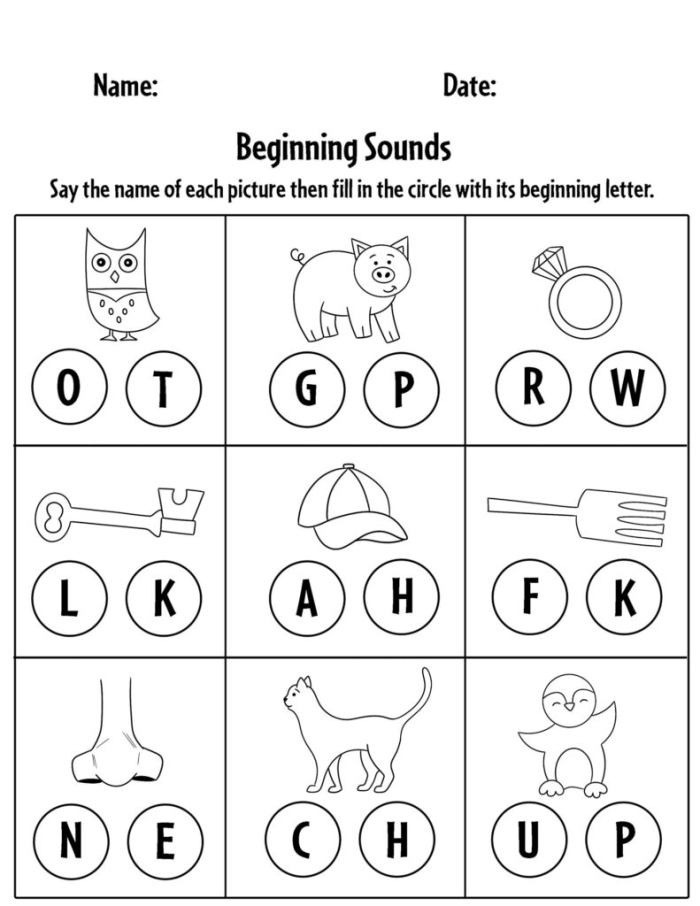 Kindergarten student matching letters to beginning sounds on a practice worksheet