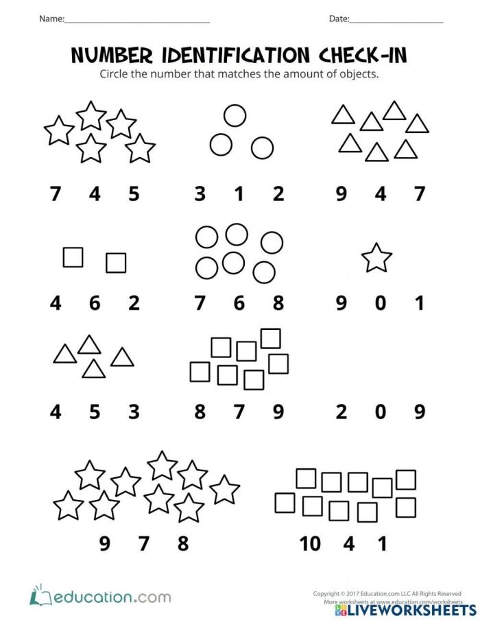 Pre-K student working on a Number Identification Check-In worksheet for numbers 0 through 10