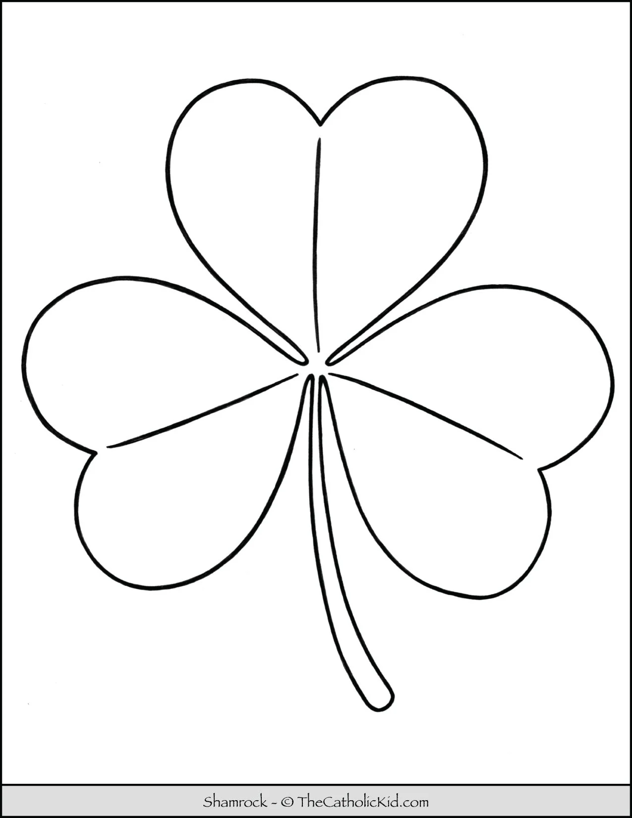 A child's hand coloring a green shamrock on a festive St. Patrick's Day worksheet