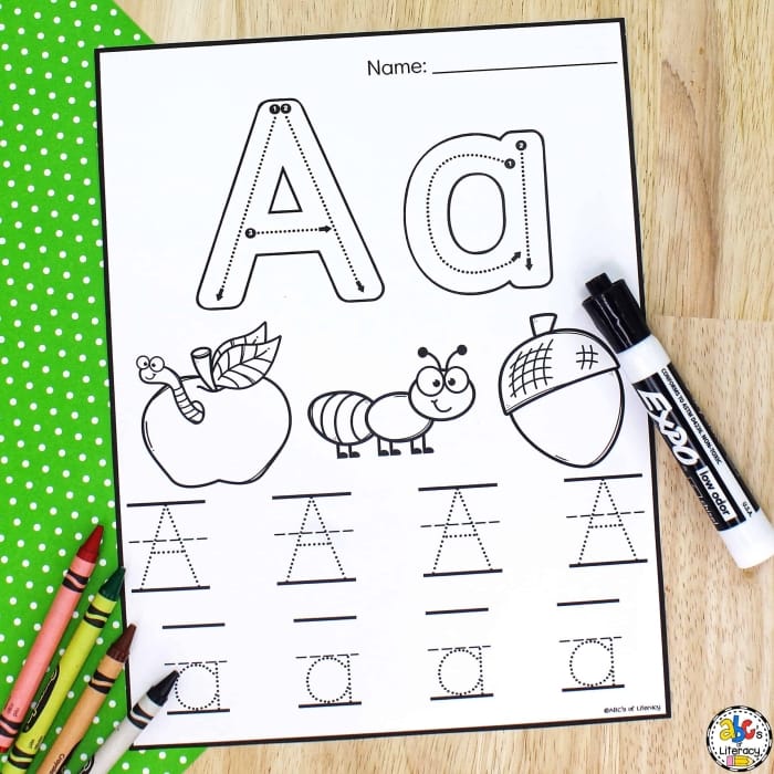 Pre-K alphabet worksheet featuring dotted letter A characters for children to practice tracing