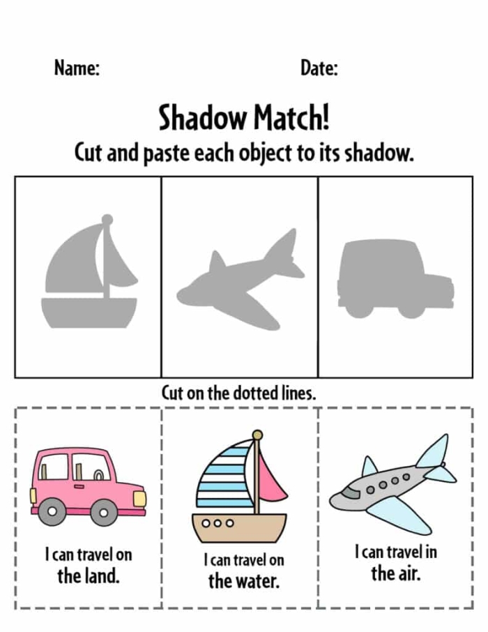 A preschooler sorting cut-out vehicle shapes onto their proper transportation backgrounds