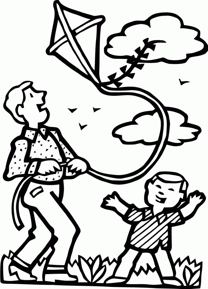 A young child holding a colorful kite on a bright spring day in the Color the Kite-Flying Fun worksheet