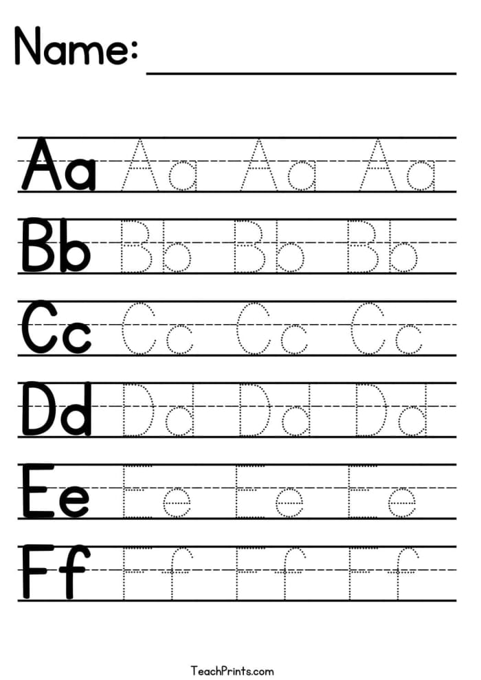 Pre-K student tracing the letter A on a practice alphabet worksheet 19