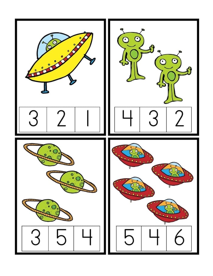 Pre-K space themed color by number worksheet featuring a cute alien and rocket ship