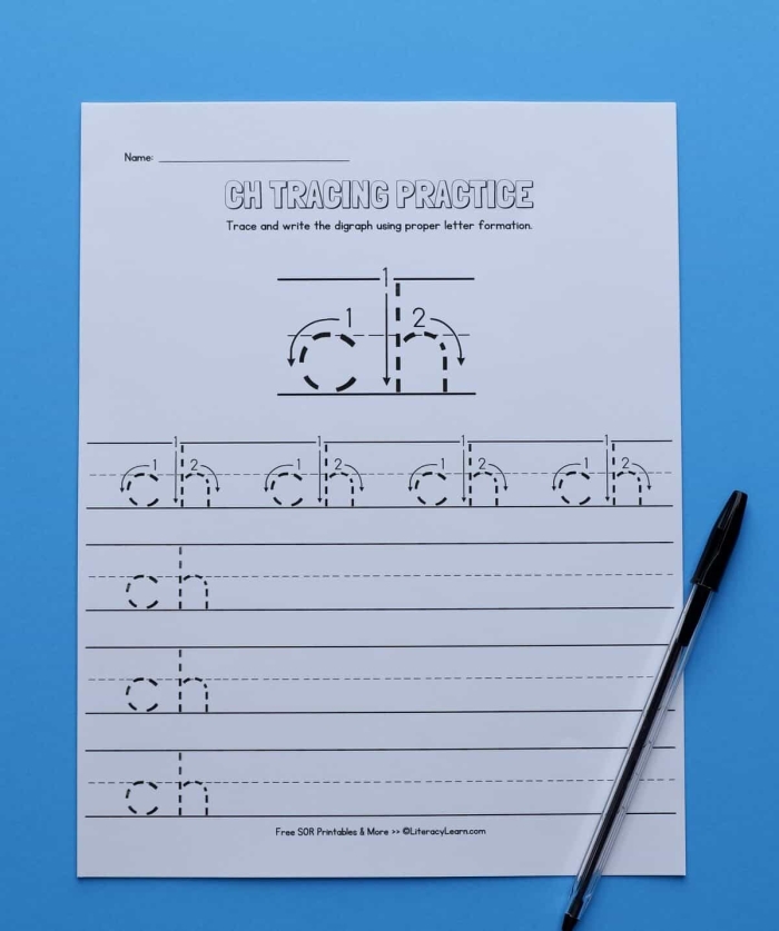 Preschooler practicing phonics by identifying CH words on a printable worksheet