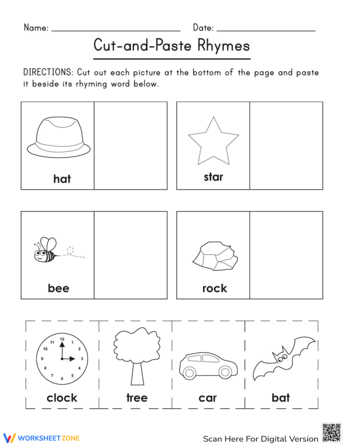 Kindergarten student cutting out pictures of animals and objects to match rhyming pairs for a life science lesson