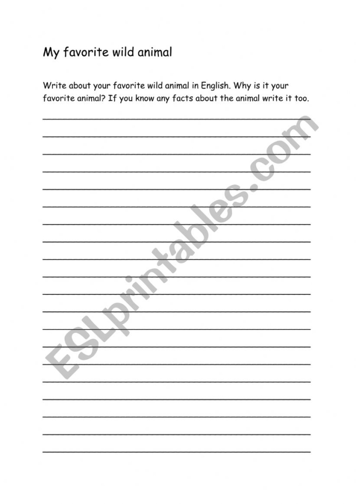 A second-grade student writing about their favorite animal on a worksheet with facts and illustrations