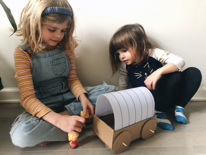 Make a Covered Wagon! worksheet for second graders to explore geometry Colorful printable worksheet for creating a paper covered wagon design