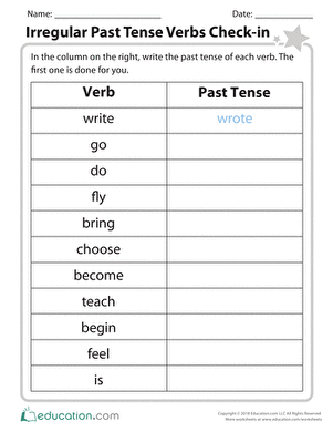 Second grade students matching irregular present and past tense verbs on an educational worksheet